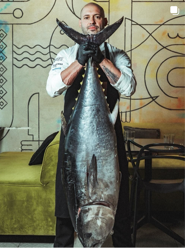 Saltz chef holding a tuna